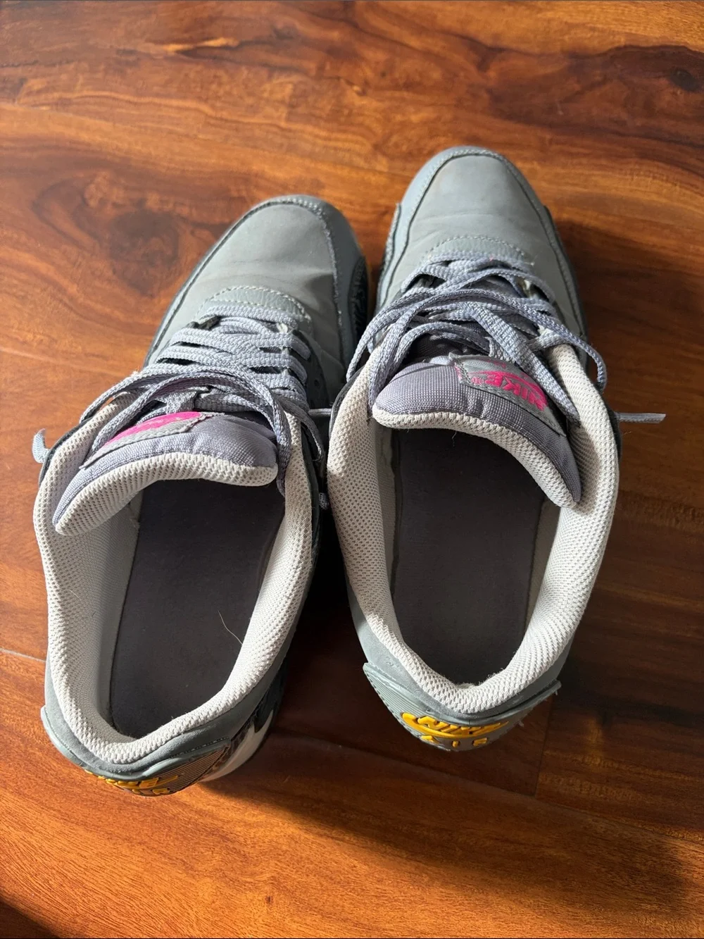 Nike Gray Sneakers with Pink Logo and Yellow Outsole